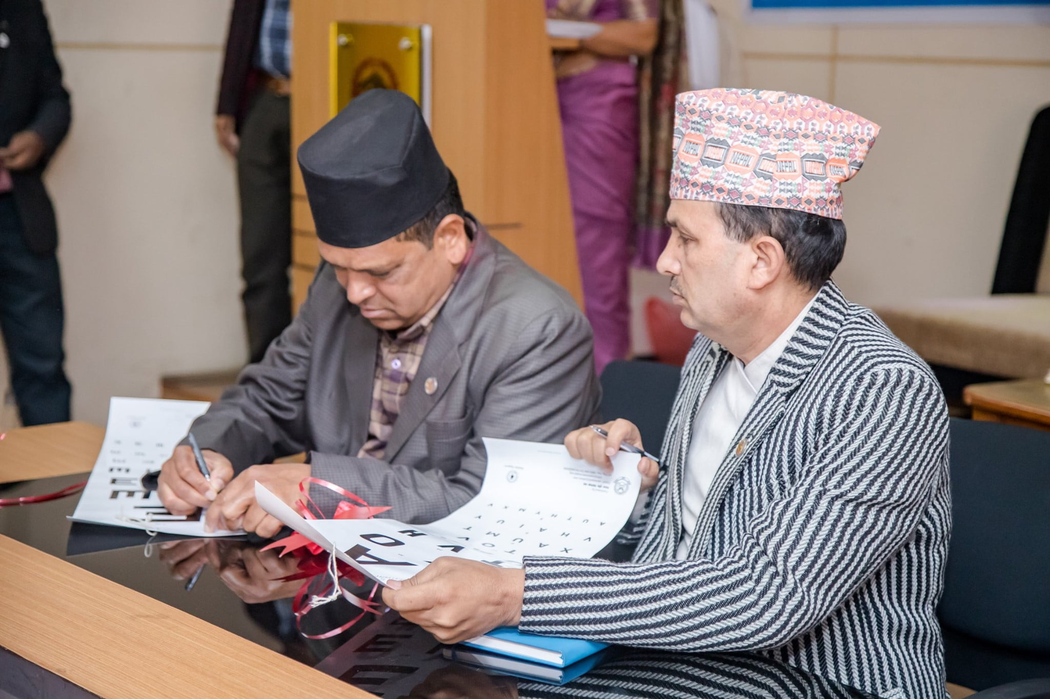 Health minister of Nepal sign the vision screening month ceremony