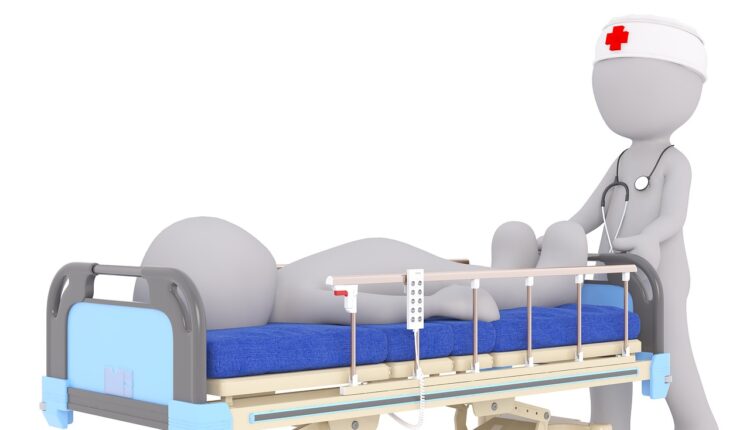 Hospital bed patient and doctor