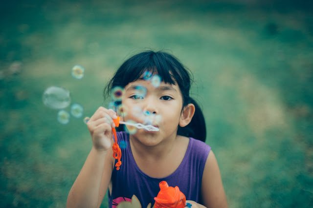 girl playing outside